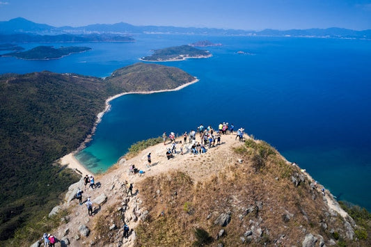 Hikers on top of Sharp Peak in Sai Kung